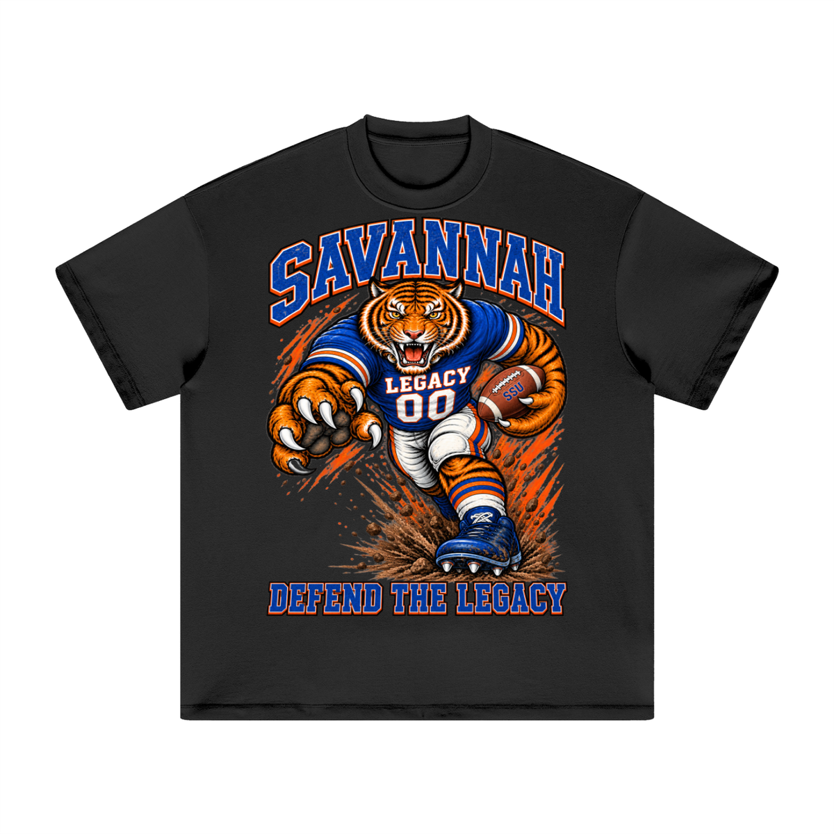 Front view of the black Savannah State Defend Tee with a football tiger graphic and Defend the Legacy lettering in royal blue and orange.