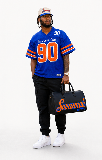 Savannah State Legacy cap with Tigers 90 jersey and travel bag studio lifestyle